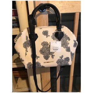 Cream and lace pattern purse.